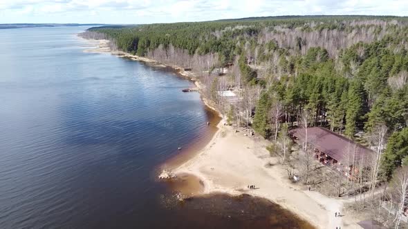 Aerial View of the Vuoksi River, the Forest and the Settlement in Autumn Day, Losevo, Leningrad