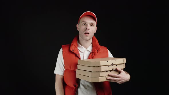 Man From Delivery Service Holding a Lot of Cupboard Boxes with Food Order alt