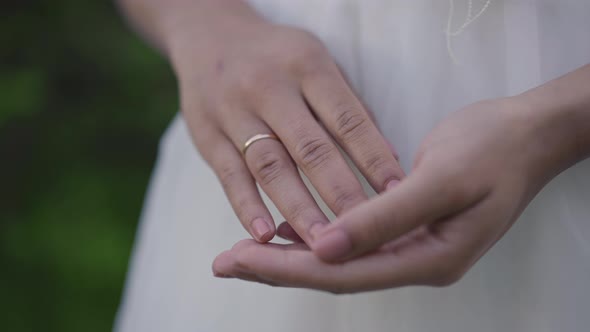 Closeup Hand of Newlywed African American Woman with Ring on Finger alt