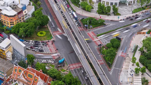 Bangkok business district city center above intersection and traffic during rush hour - Time Lapse