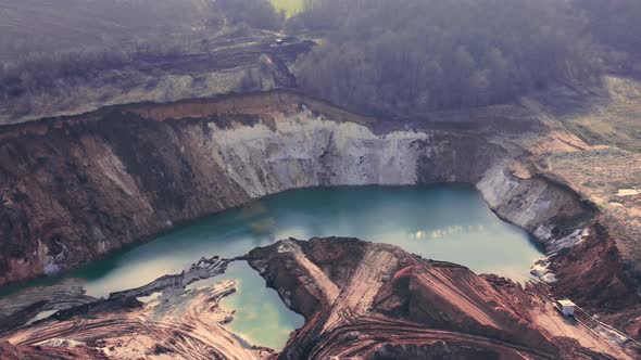 Narrow Blue Lake with Azure Water on a Sand Quarry