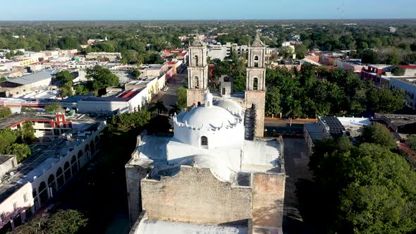 Aerial push in to the towers from back of the Catedral de San Gervasio showing full depth of the chu alt