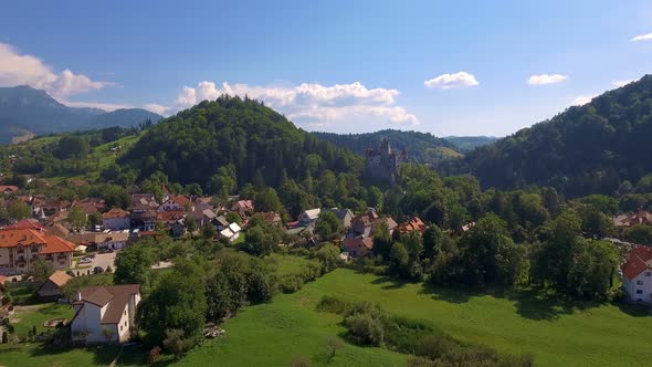 Village in Mountains in Summer Day