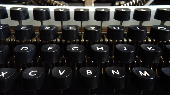 Vintage typewriter keys closeup. alt