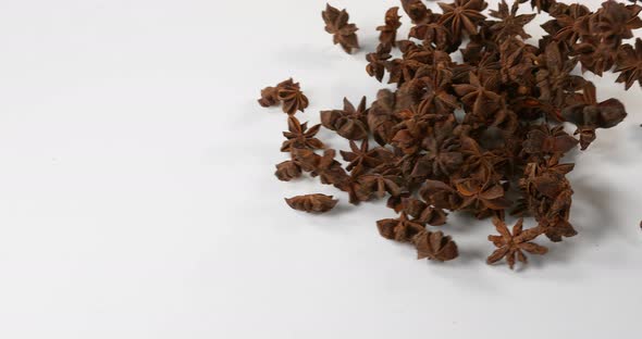 Star Anise illicium verum,, spice falling against White Background, Slow Motion 4K alt