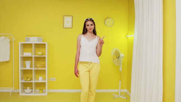 Young Woman Is Showing Gesture of Denial alt