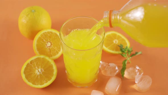 Orange slices and juice. alt