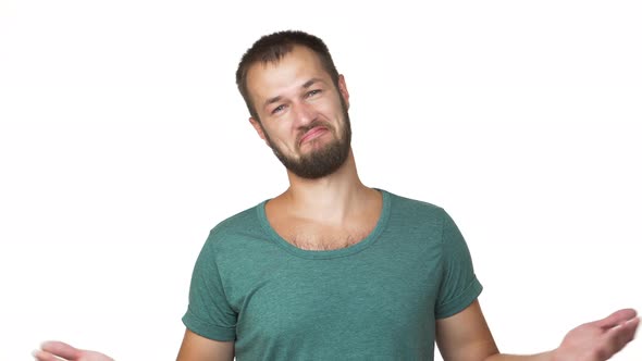 Horizontal Portrait of Adult Guy with Short Brown Hair Smiling Being Pleased Clapping in Approval alt