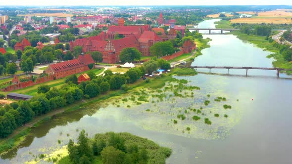 Castle fortifications of the Teutonic Order in Malbork from East. Malbork Castle is the largest cast alt