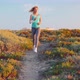 Runner Woman Running in the Sunny Path Road Near Ocean - VideoHive Item for Sale