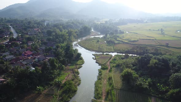 Vang Vieng city in Laos seen from the sky alt
