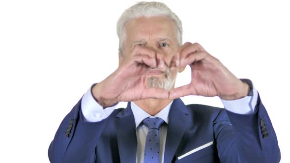 Handmade Heart By Old Businessman Isolated on White Background alt