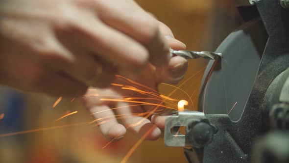 Close-up Photo of Sparks From Working on Machine alt