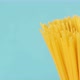Pasta Spaghetti Closeup on a Blue Background Rotates - VideoHive Item for Sale