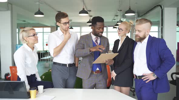 African Leader Manager Colleagues Discussing Project Business Idea alt