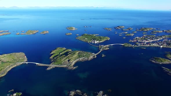 Flying over fishing town Henningsvaer on Lofoten islands, Norway alt