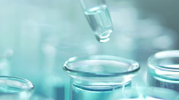 Drop a Pipette into Test Tubes alt