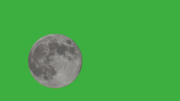 Time lapse shot of rising full moon on green screen background,computer graphic alt