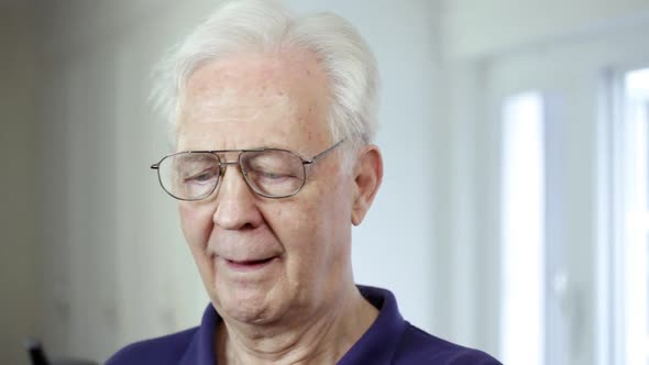 Senior man on cellphone alt