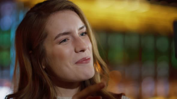 Portrait of Beautiful Girl Having Video Call By Mobile Phone Outdoors alt