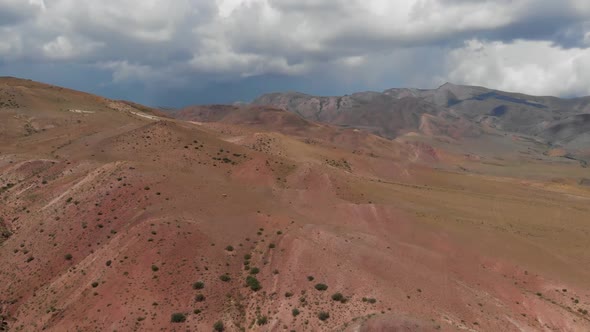 Amazing Aerial Video of the Textured Yellow and Red Mountains Resembling the Surface of Mars in