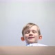 Schoolboy Opens a Box with a Gift, Happy Surprised Emotions - VideoHive Item for Sale