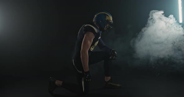 American Football Sportsman Player Raising His Head