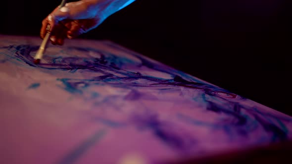 Inspiration in Night Contemporary Artist is Working in Dark Workshop Woman is Painting Picture alt