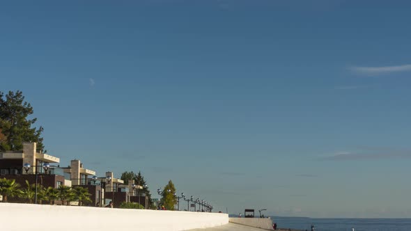 People Walk Along the Waterfront Time Lapse