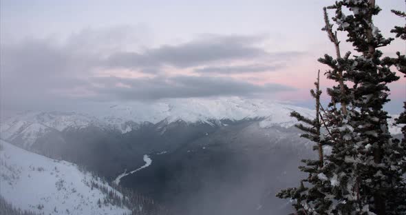 Mt Rainier Motion Time Lapse Sun Rise Morning Colors Fog Clouds Passing By Tree Foreground alt