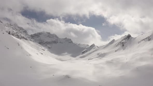 Snowy mountain landscape with drone