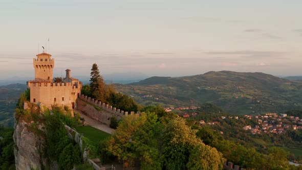 Flying over the amazing hilltop fortresses on Monte Titano in San Marino. alt