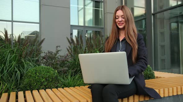 Young Lady Using Laptop alt
