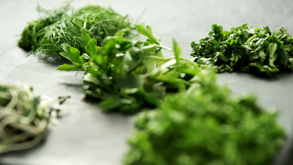 Various herbs on chopping board 4k alt