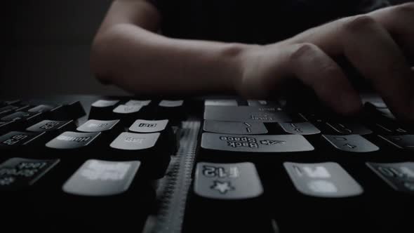 Close-up time lapse typing on keyboard with fingers. Macro soft focus dolly shot alt