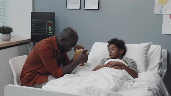 Dad Praying for Son in Hospital alt