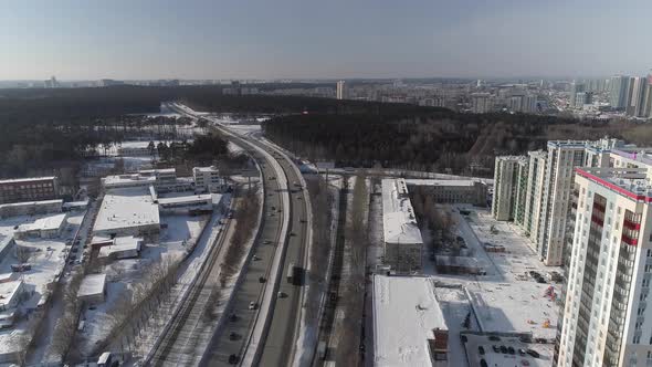 Aerial view of Highway with car traffic in the winter city 07 alt