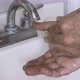 Man Washing His Hands Against Germs - VideoHive Item for Sale