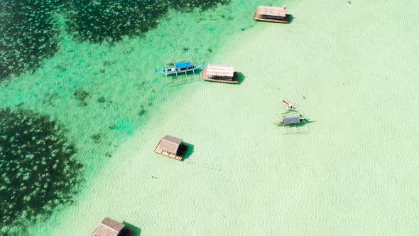 Manlawi Sandbar Floating Cottages in Caramoan Islands. A Lagoon with Floating Crotches, Top View. alt