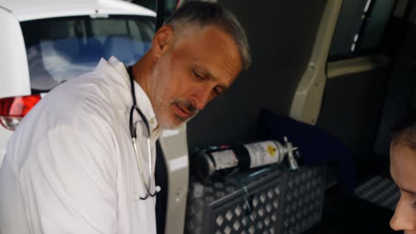 Emergency medical technicians talking alt