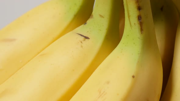 Tasty banana fruit background fresh arranged in a row 4K 2160p 30fps UltraHD tilt footage - Musa acu alt