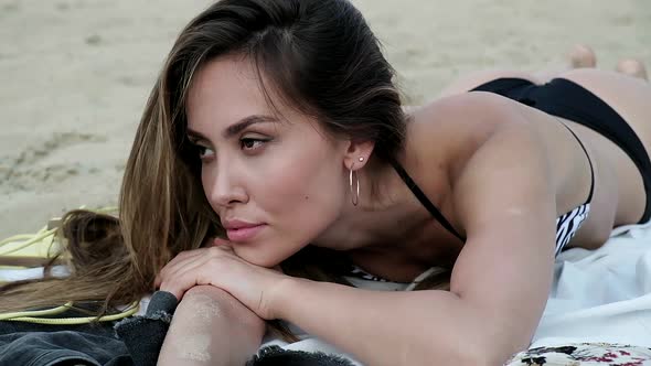 Sexy Seductive Young Asian Woman in Swimsuit Sunbathing Chilling at Sandy Beach alt
