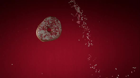 Doughnuts falling and bouncing in ultra slow mo  alt
