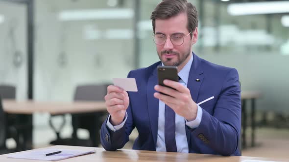 Businessman Making Successful Online Payment on Smartphone alt