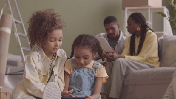 African American Family Renting or Buying New Apartment alt