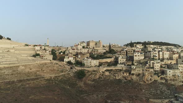 Aerial view of buildings near the cemetery alt