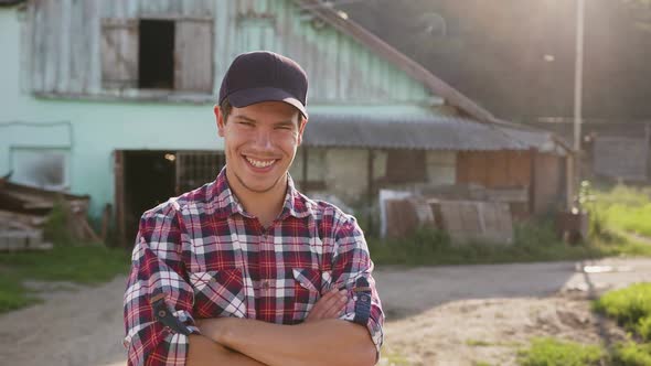 A Sincere Smiling Farmer Rejoices at the Beginning of a New Day alt