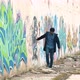 Drawing a graffiti painted wall with a stone. - VideoHive Item for Sale