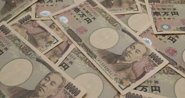 Stack of Japanese Yen banknote alt