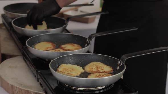 Frying Latkes or Potato Pancakes